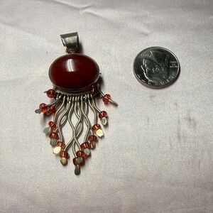 Elegant Sterling Silver and Deep Orange Pendant